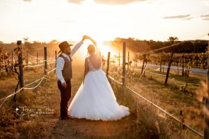 bride and groom dancing in the southburnett sunset